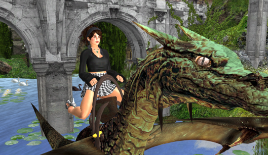 Taking a free Dragon ride at DaVinci Gardens